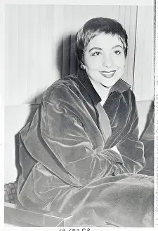 Prints of (Original Caption). Heart interest of Marlon Brando, Josanne Mariani, is pictured on arrival at International Airport. I do not want publicity, said the French miss, who is here to appear on a TV show The Iconic Moments Captured: Portrait of Josanne Mariani