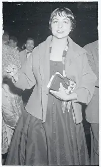 Prints of (Original Caption). Pretty Josiane Mariani Berenger, 19 year old fiancee of movie star Marlon Brando, is shown on her arrival in Paris from Bandol, where they announced their engagement The Iconic Moments Captured: Portrait of Josiane Berenger