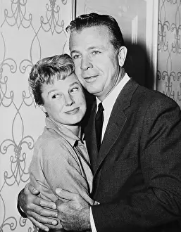 Portrait of June Allyson Hugging Husband Dick Powell