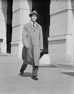 Business Man Prints: Portrait of man walking along sidewalk