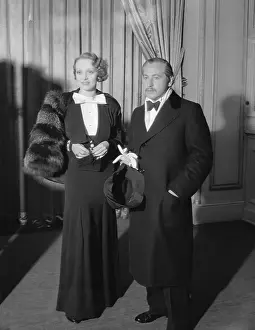 Portrait of Marlene Dietrich and Joseph von Sternberg Standing by Curtains