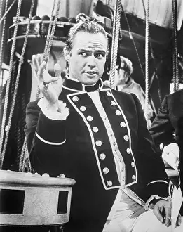 Prints of (Original Caption). Marlon Brando in Mutiny on the Bounty, directed by Lewis Milestone The Iconic Moments Captured: Portrait of Marlon Brando