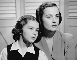 Portrait of mother & daughter