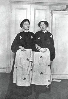 Portrait of mother and daughter suffragettes