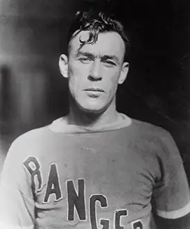 Prints of (Original Caption). Bill Cook, a member of the Rangers hockey team, is shown in this close-up photograph Frozen Moments: A Journey Through Hockey History: Portrait of New York Ranger Bill Cook