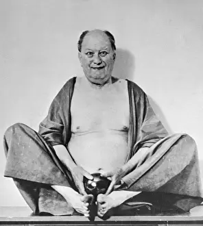 Portrait of Occultist Aleister Crowley Sitting on Floor