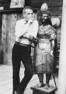 Portrait of Paul Newman with Native American Statue