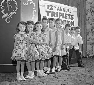 Portrait of Three Sets of Triplets
