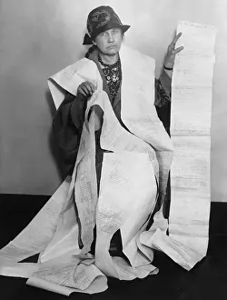 Portrait of Supporter Alicia Mosgrove with Large Document
