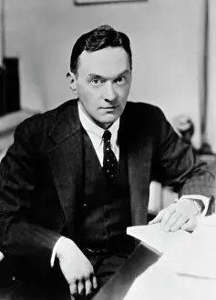 Portrait of Walter Lippmann Sitting at Desk