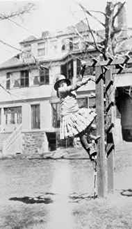 Portrait of Young Anne Morrow Climbing Arbor