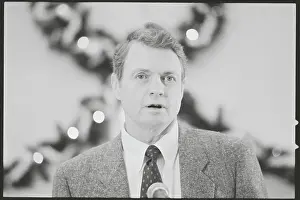 Portraits of Football Coach Tom Osborne Speaking at Press Conference