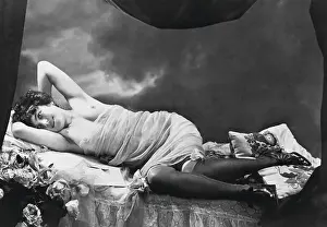 Postcard with Young Woman Lounging on Her Side