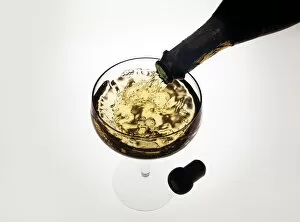 Pouring A Glass Of Sparkling Wine