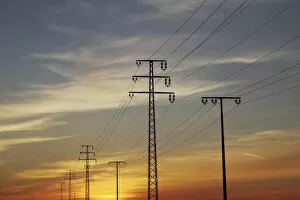 Power poles, sunset, Upper Swabia, Baden-Wuerttemberg, Germany, Europe