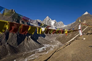 Prayer flags on dusty mountainside