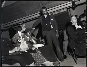 Touching Prints: Preacher Touching Congregation Member