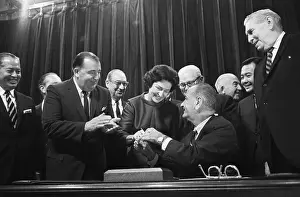 Handing Prints: Pres. Johnson Handing Pen To Lady Bird