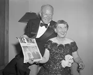 Pres.Eisenhower and Wife with Paper