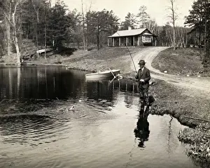 Cabin Prints: President Calvin Coolidge Fishing at Hideaway Cabin Site