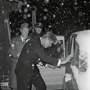 Snowfall Prints: President-Elect Kennedy Entering Car in Snowfall