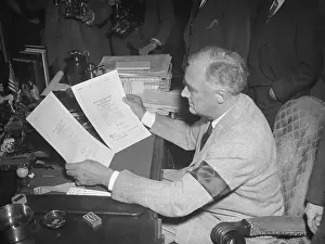 President Franklin D. Roosevelt Working at His Desk