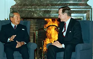President George Bush Conversing with Thailand's Prime Minister