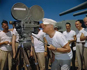 President Harry Truman with Movie Camera on USS Missouri
