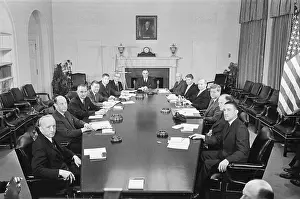 Prints of President John F. Kennedy poses with his cabinet at the White House. Left to right are Edward Day, Postmaster General; Adlai Stevenson, UN Ambassador; Vice President Lyndon B LBJ Unveiled: Iconic Moments from a Presidential Era: President John F. Kennedy poses with his cabinet at the White House