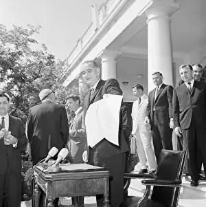 President Johnson Holding Economic Opportunity Act