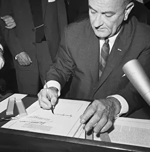 Suffrage Prints: President Johnson Signs the Voting Rights Bill
