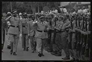 President Kasavuba Saluting Troops