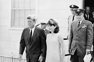 President Kennedy Escorting Wife