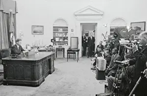President Kennedy in Oval Office with Television Cameras