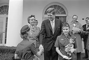 President Kennedy Posing with Girl Scouts