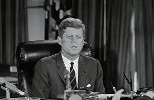 President Kennedy Speaking from Desk