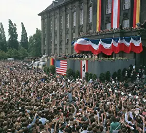 President Kennedy Waving to Crowd Outside City Hall