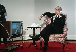President Lyndon Johnson Sitting in Chair and on Phone