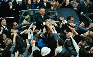 President Lyndon Johnson and His Wife Riding in Car