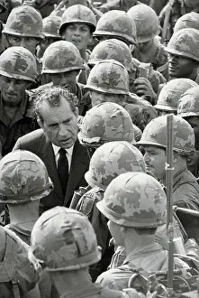 President Nixon with Helmeted Soldiers