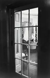 President Nixon Reclining with Feet on Desk