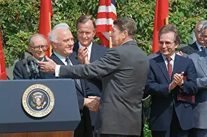 President Reagan and Eduard Shevardnadze Shaking Hands