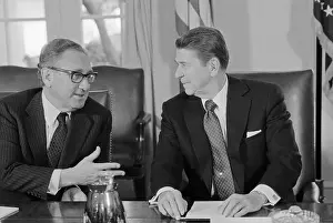 President Reagan Speaking with Henry Kissinger