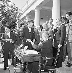 President After Signing War On Poverty