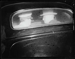 President Truman and General MacArthur Sitting in Car