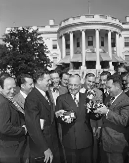 Official Prints: President Truman Presented With Cameras