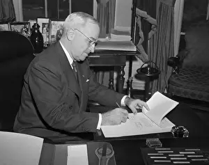President Truman Signing Congressional Bill
