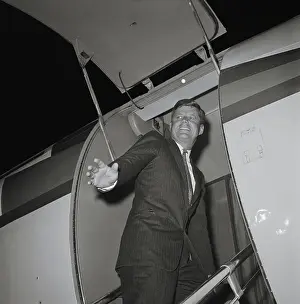 Passenger Airplane Prints: Presidential Candidate John F. Kennedy Boarding Plane Caroline
