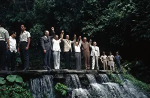 Presidents Posing on Top of Waterfall