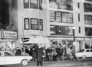 Sullivan Prints: Press Gather in Front of Apartment